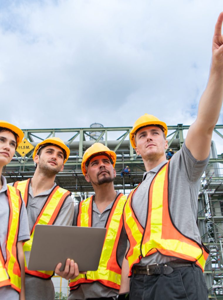 Group of Petroleum engineer is on a mission to inspect oil distillation at a huge oil refinery